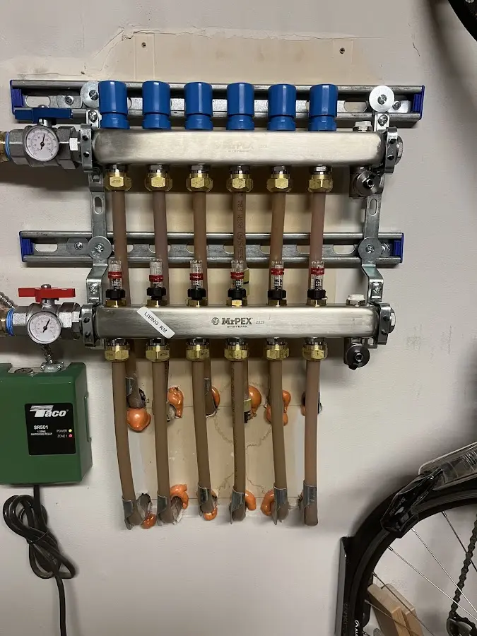 Plumber performing Leak Detection at a residential property in West Pikeland